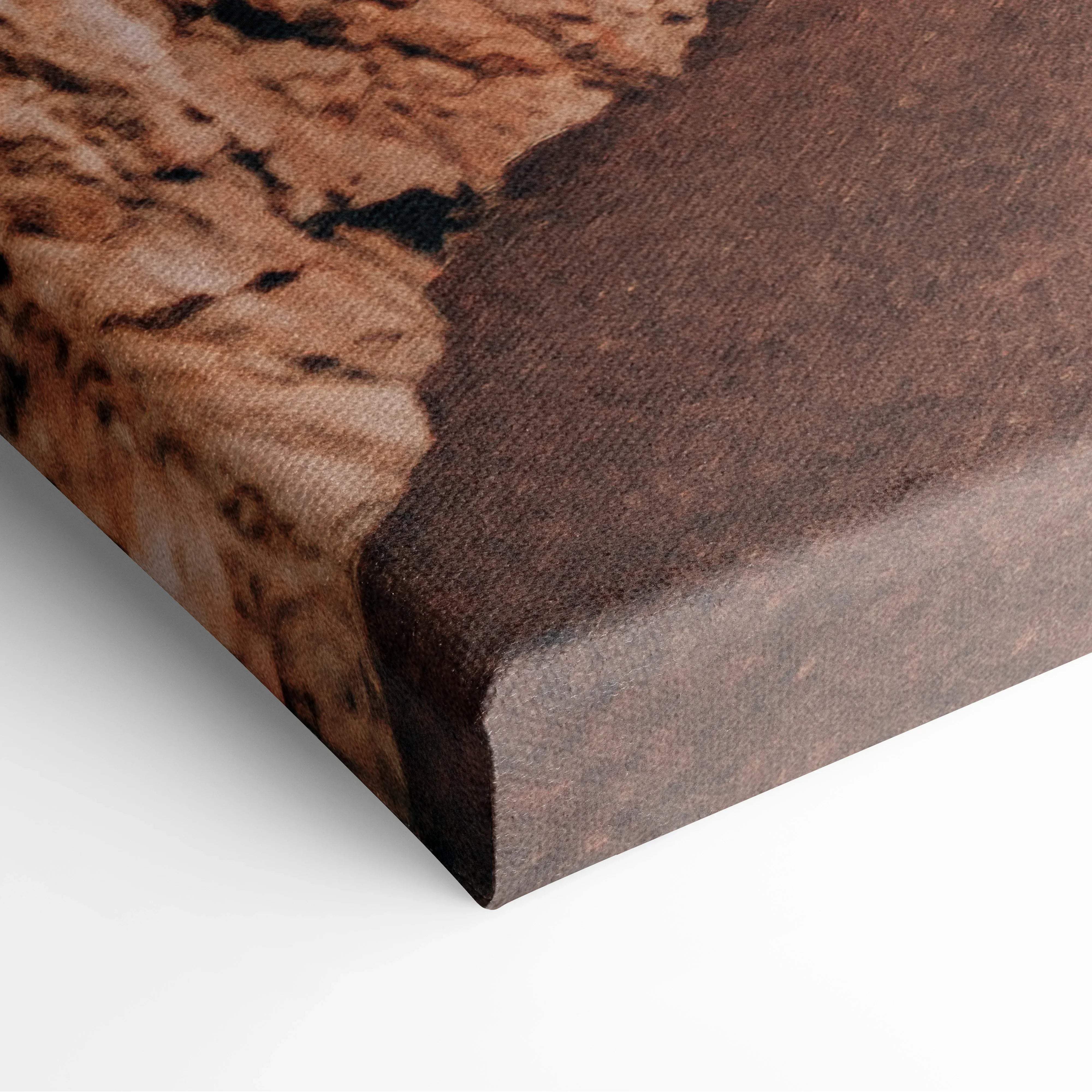 Brown canvas wall art with textured natural wood grain design in ocean blues and warm stone tones for coastal decor