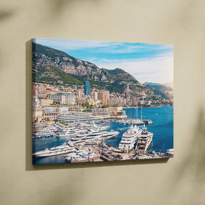 Canvas wall art featuring a vibrant coastal cityscape with yachts and mountainous backdrop.