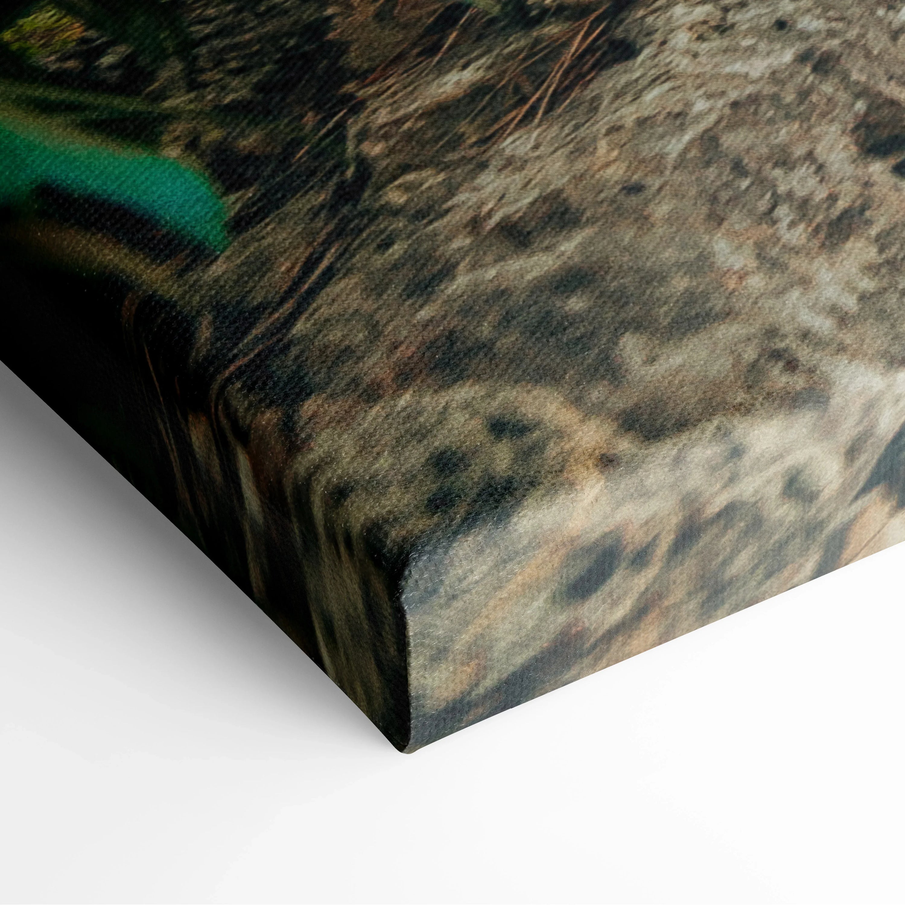 Close-up of canvas art wall print featuring textured sandy beach with abstract building shapes in muted earth tones.