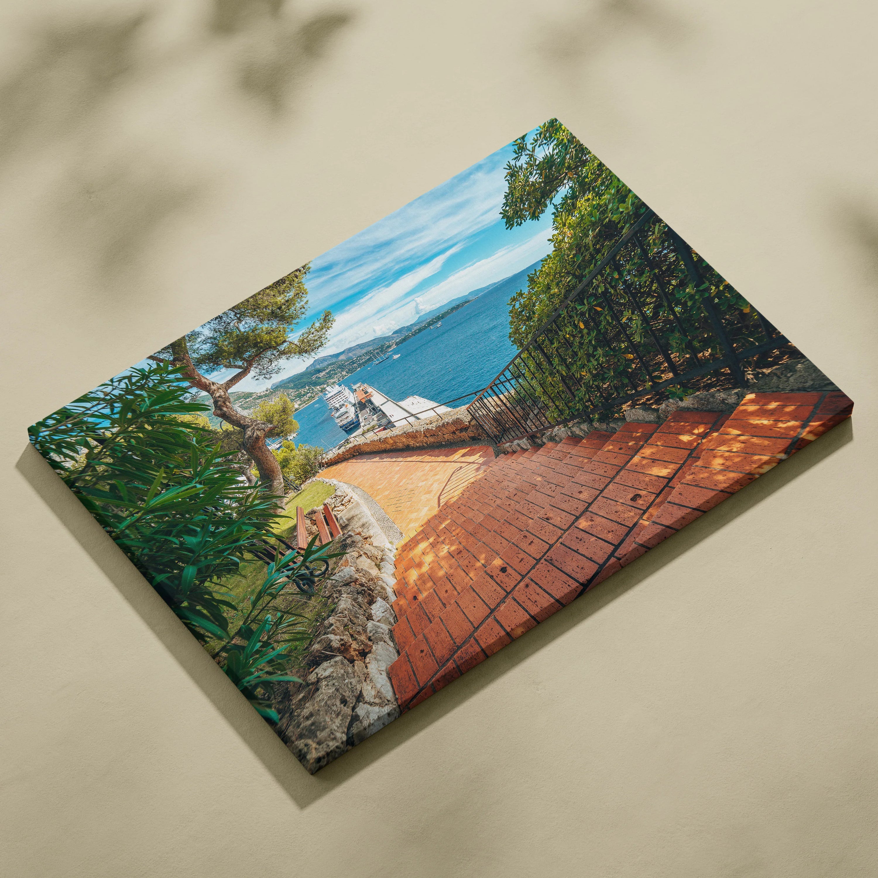 Canvas wall art featuring a sunlit beachside pathway with vibrant greenery and blue ocean view.