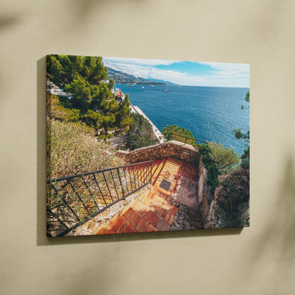 Canvas wall art featuring a scenic coastal staircase with lush greenery and blue ocean background.