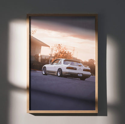 Nissan 240sx S13 Silvia poster with sunset background, automotive wall art in wooden frame.