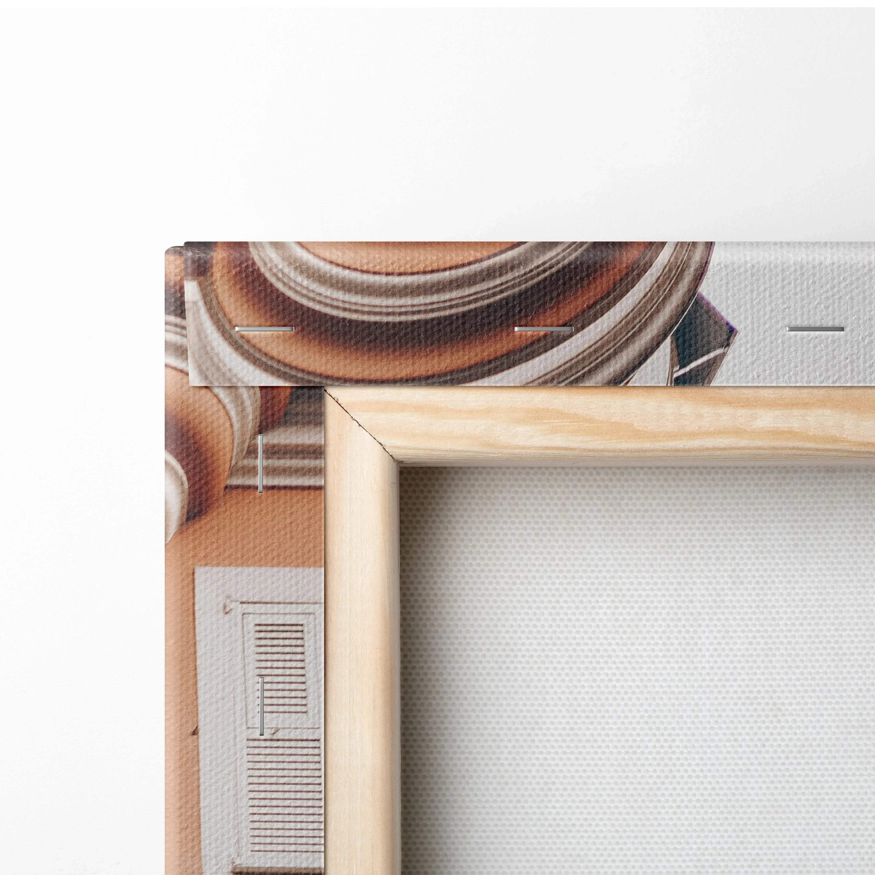 Corner view of stretched canvas wall art with abstract architectural digital print and natural wood frame.