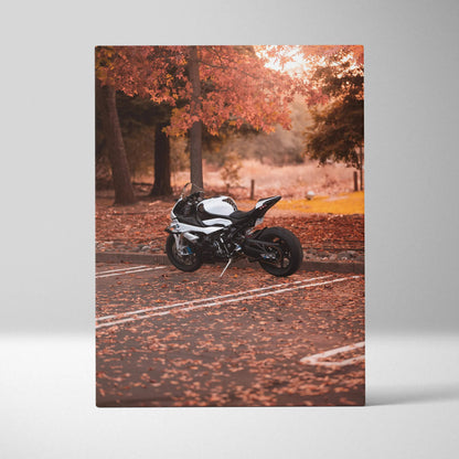 Vertical canvas art featuring a BMW S1000RR motorcycle amid autumn leaves wall art.