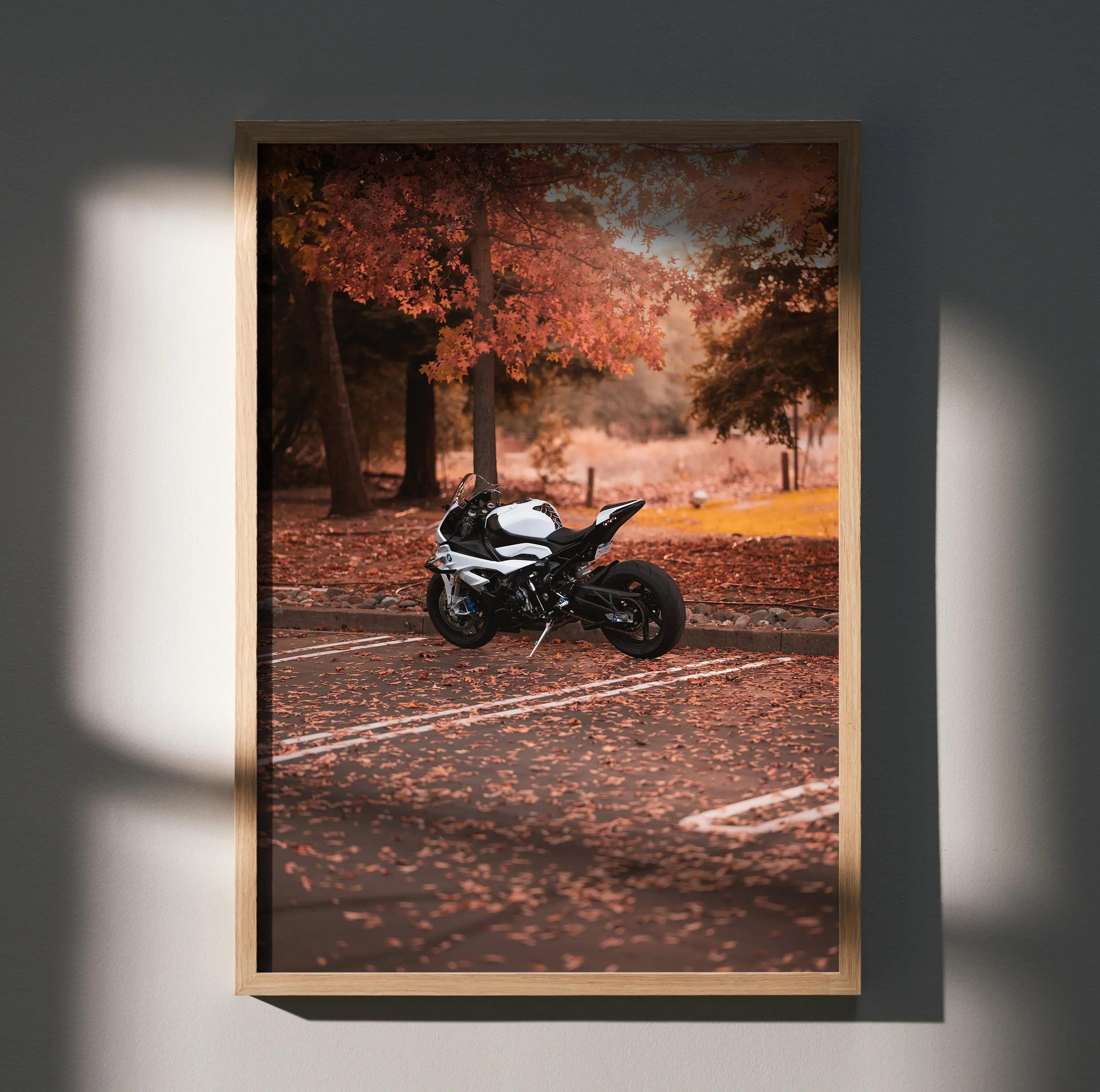BMW S1000RR motorcycle poster with autumn forest background, stylish wall art in wooden frame.