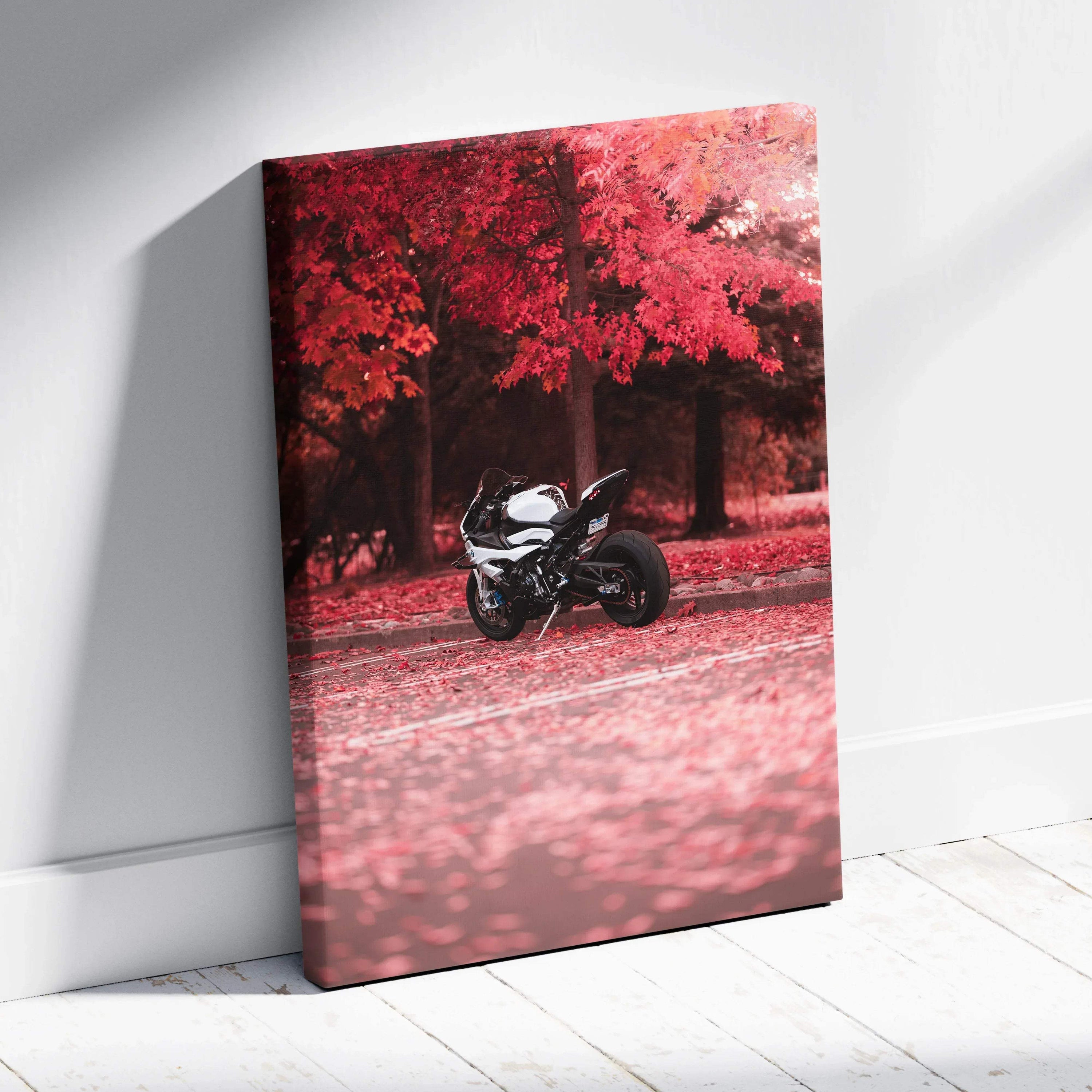 Vertical canvas art featuring a black and white BMW S1000RR motorcycle against vivid red autumn trees wall art.