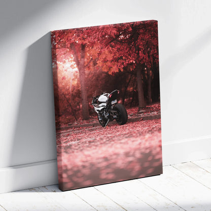 Vertical canvas wall art featuring a BMW S1000RR motorcycle in a red autumn forest setting.