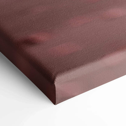 Close-up of dark red textured canvas wall art with museum-quality vertical wrap and smooth edges.