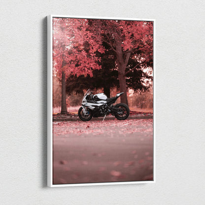 Vertical canvas art of a BMW S1000RR motorcycle parked under red autumn trees, wall art with vibrant fall colors.
