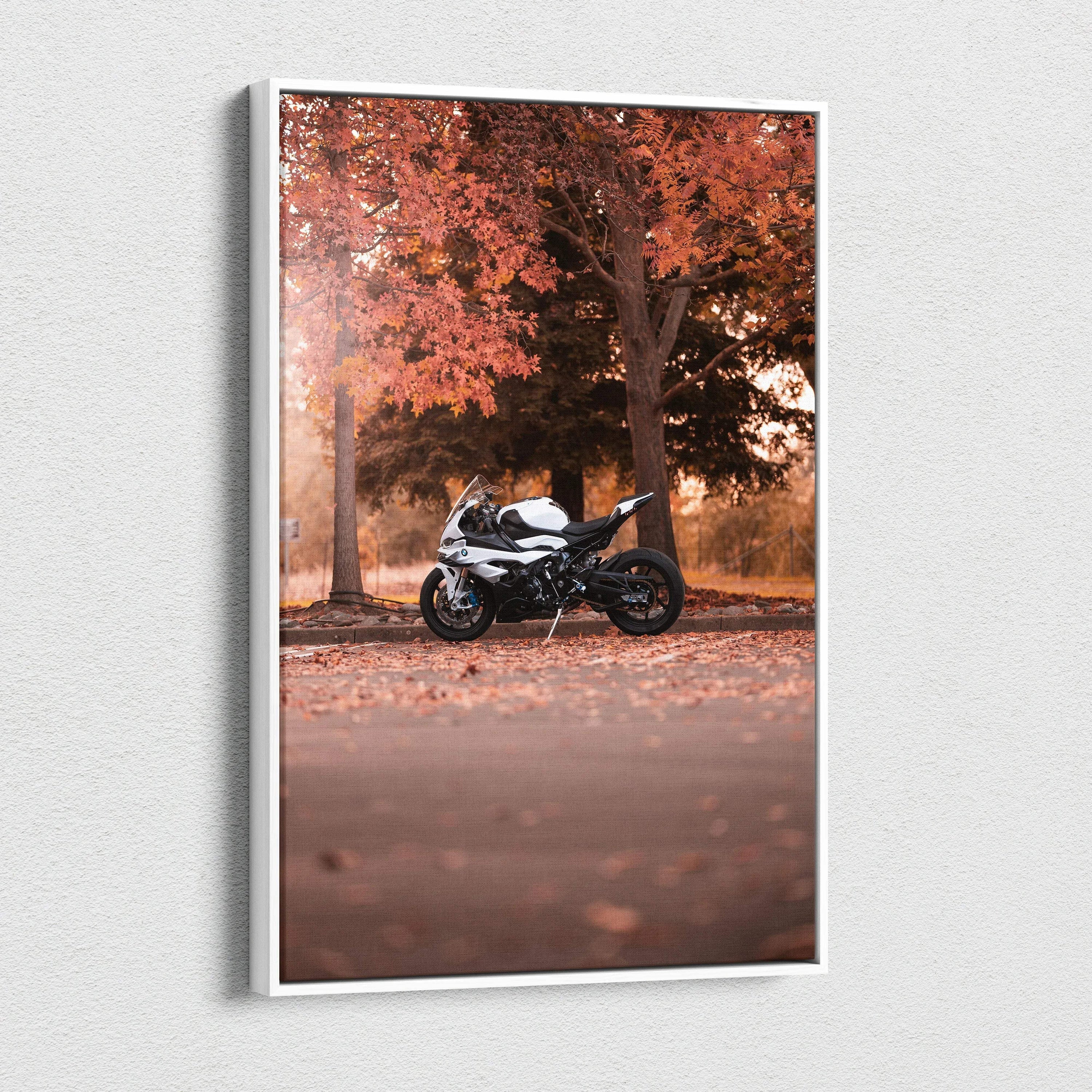Vertical canvas art featuring a BMW S1000RR motorcycle under autumn trees with fallen leaves wall art.