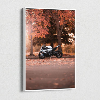 Vertical canvas art featuring a BMW S1000RR motorcycle under autumn trees with fallen leaves wall art.