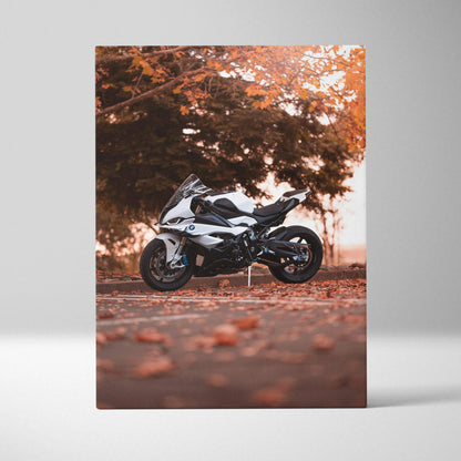 Vertical canvas art featuring a white BMW S1000RR motorcycle against autumn foliage wall art.