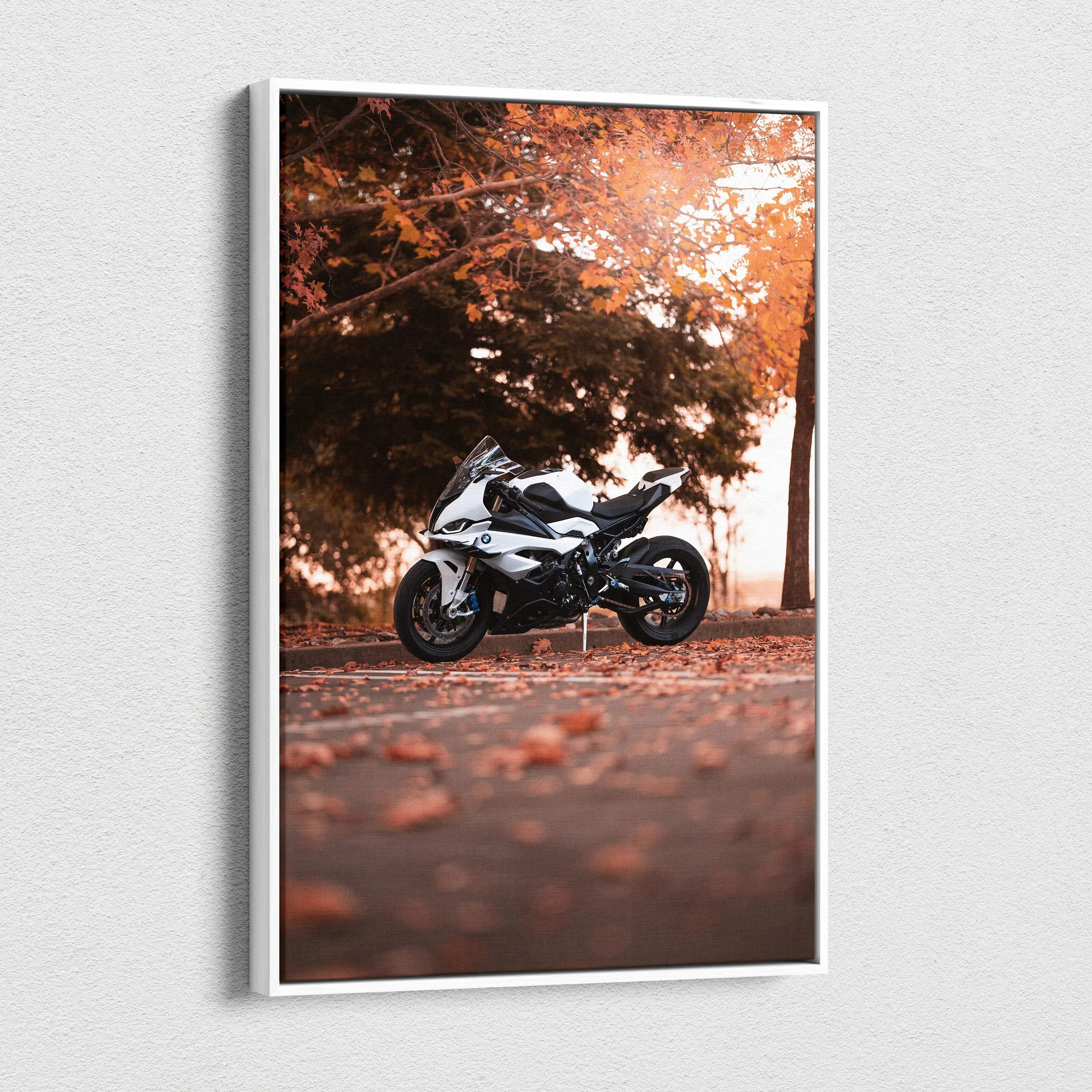 Vertical canvas wall art featuring a BMW S1000RR motorcycle in autumn setting with warm tones.