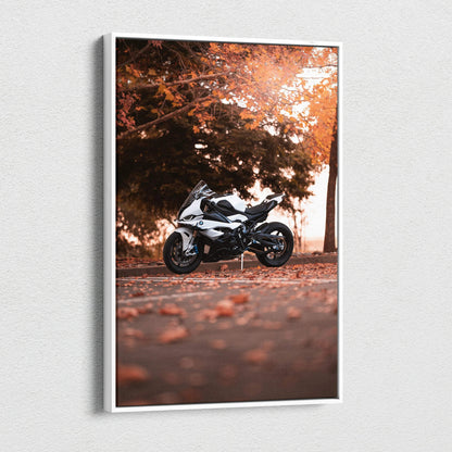Vertical canvas wall art featuring a BMW S1000RR motorcycle in autumn setting with warm tones.