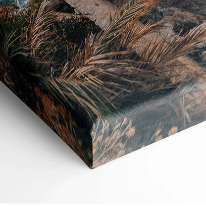 Close-up of canvas wall art featuring detailed architectural elements in earthy, muted tones with textured brushstrokes.
