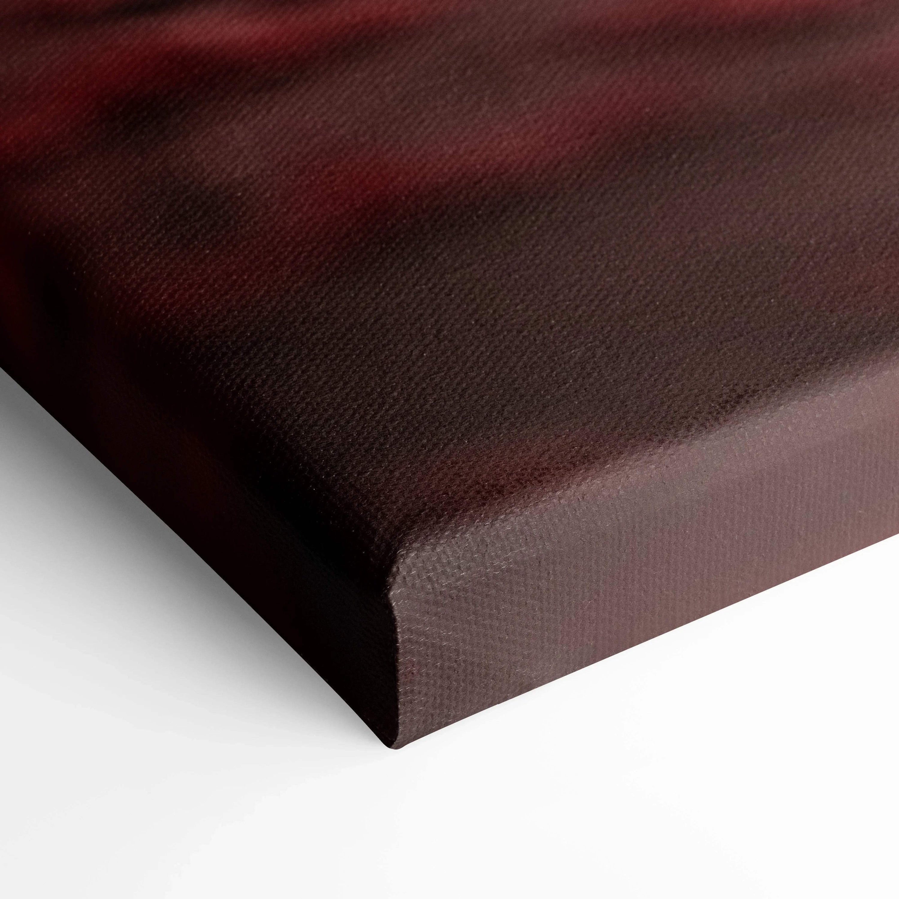 Close-up of brown textured canvas wall art edge with a deep gallery wrap thickness of 1.5 inches.