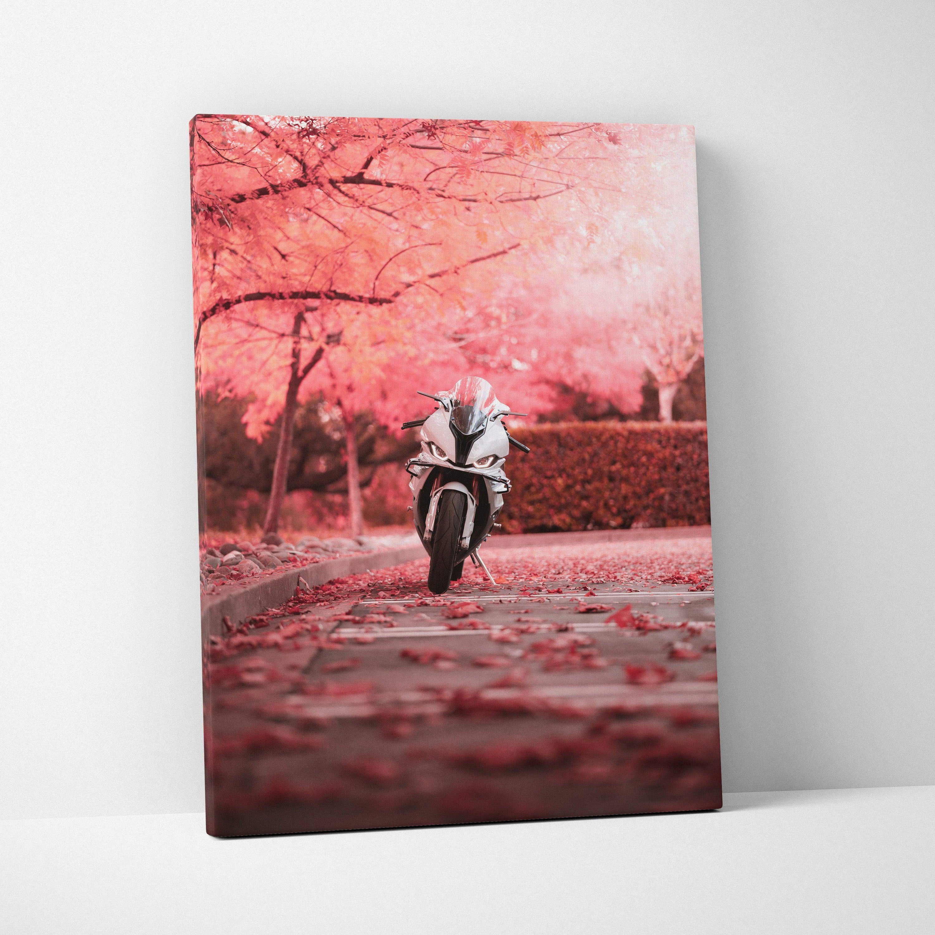 Vertical canvas art featuring a BMW S1000RR motorcycle on a pink autumn road, vibrant wall art.