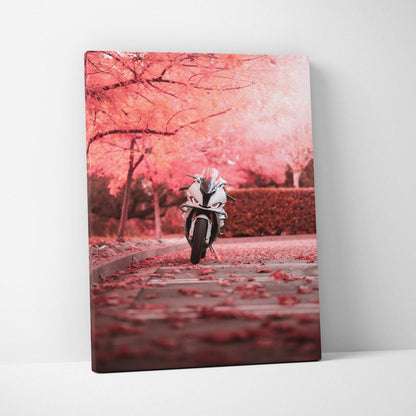 Vertical canvas art featuring a BMW S1000RR motorcycle on a pink autumn road, vibrant wall art.