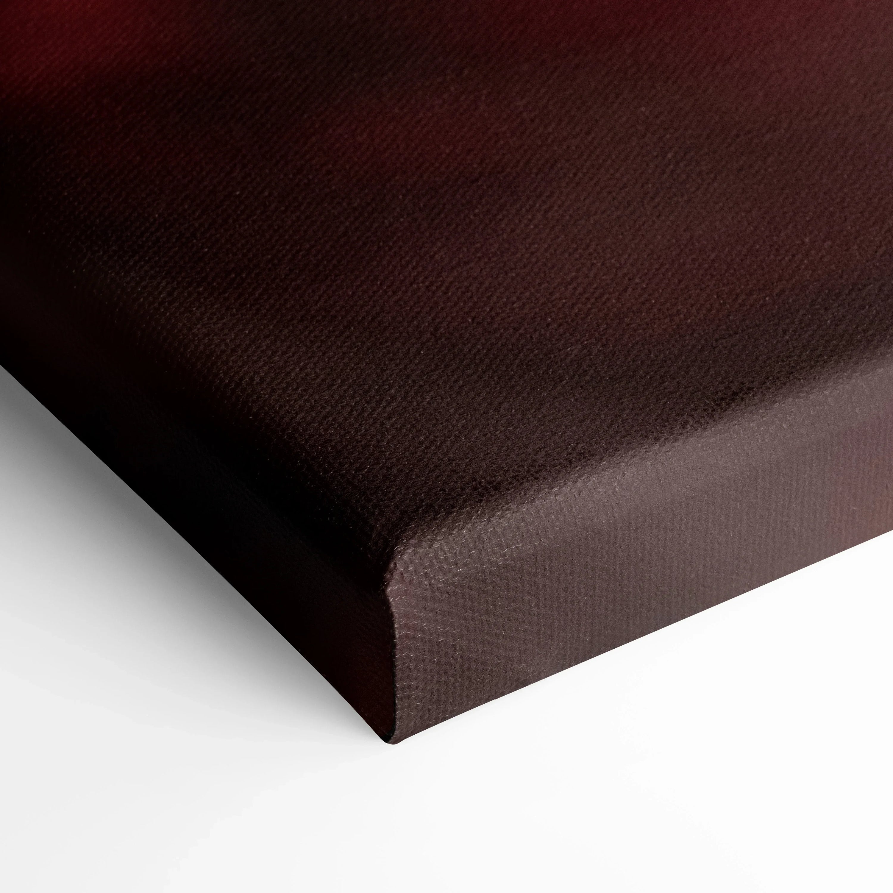 Close-up of brown wrapped canvas wall art with visible textured fibers on corner edge.