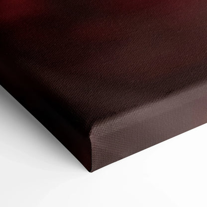 Close-up of brown wrapped canvas wall art with visible textured fibers on corner edge.