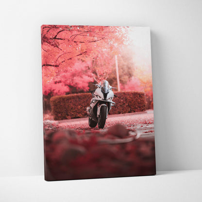 Vertical canvas wall art of a white BMW S1000RR motorcycle speeding through a pink autumn forest scene.
