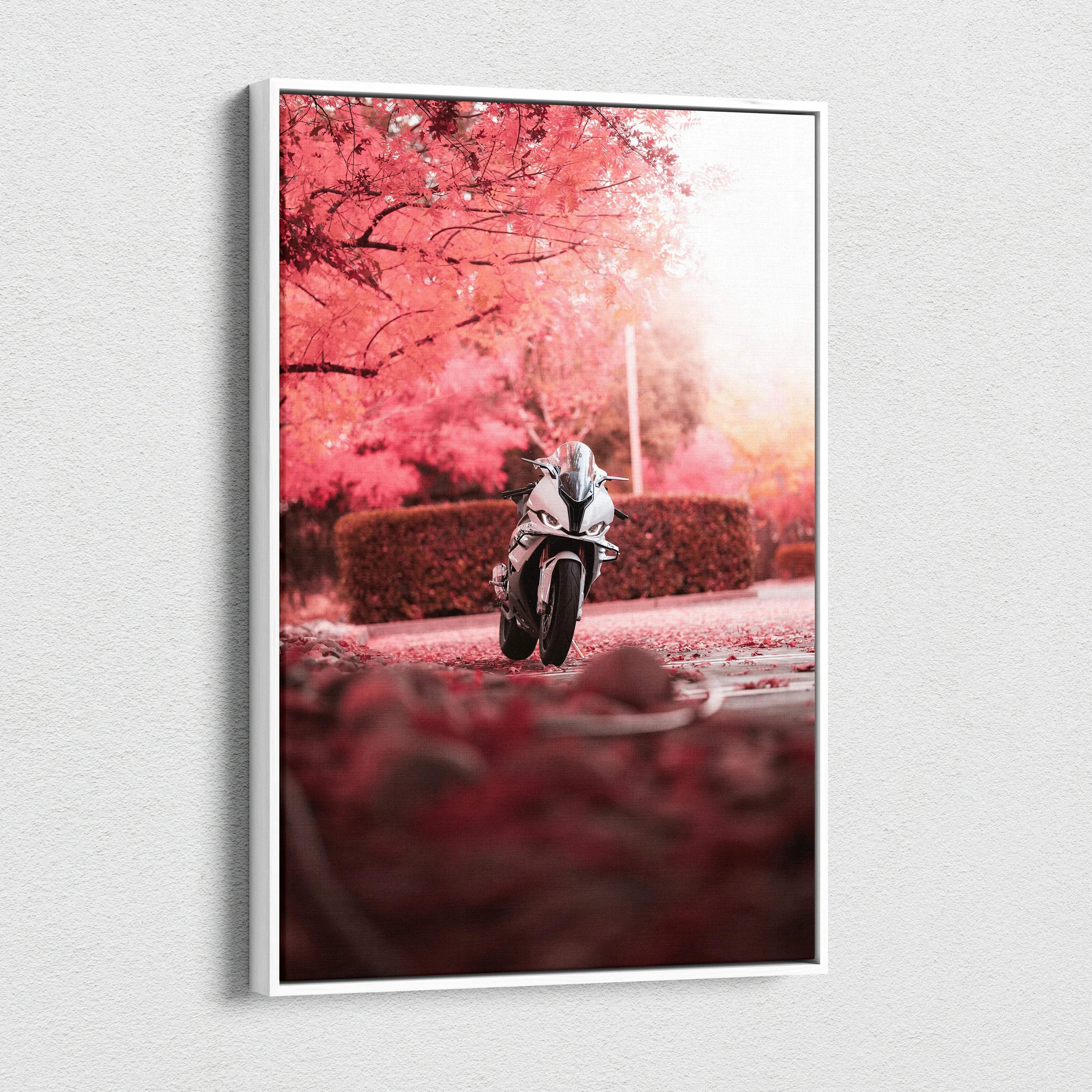 BMW S1000RR motorcycle racing through vibrant pink autumn trees canvas wall art.