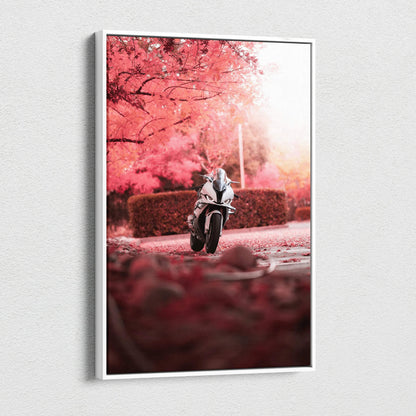 BMW S1000RR motorcycle racing through vibrant pink autumn trees canvas wall art.