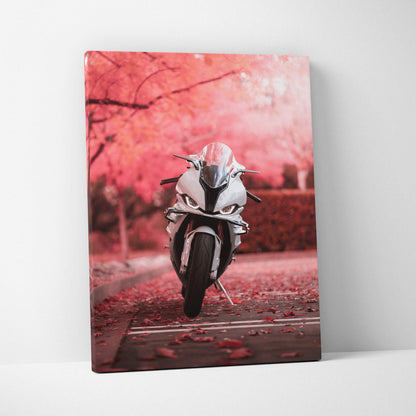 Vertical canvas wall art featuring a BMW S1000RR motorcycle with pink cherry blossom background.