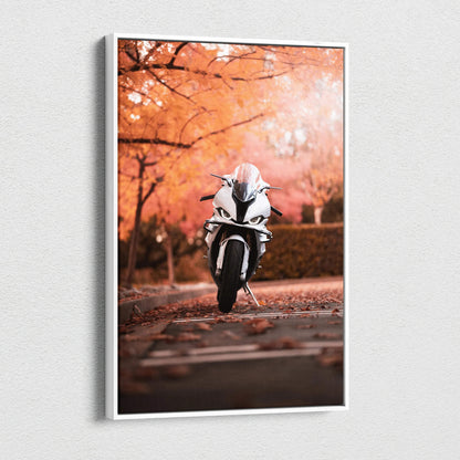 Vertical canvas wall art featuring a white BMW S1000RR motorcycle against autumn trees.