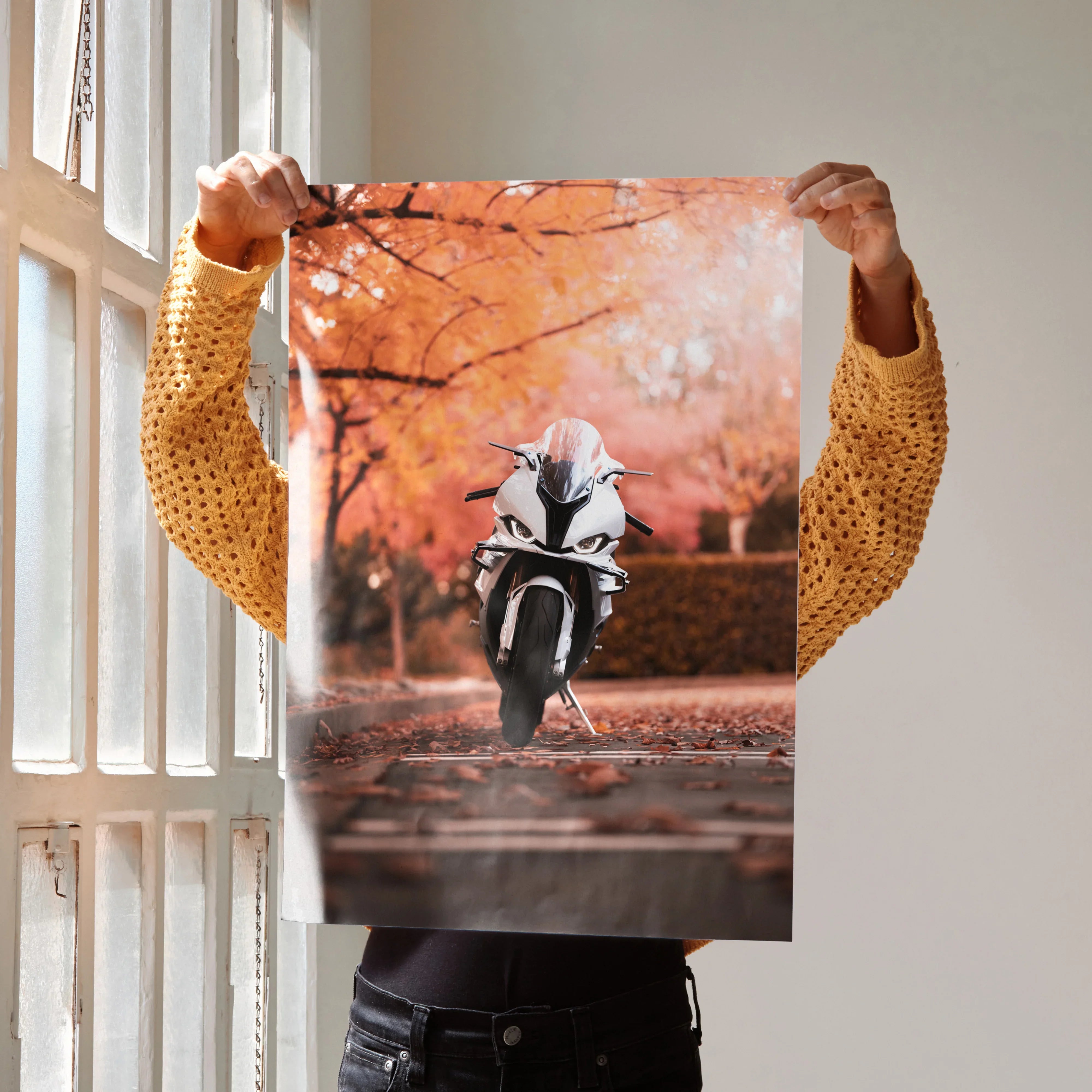 BMW S1000RR motorcycle poster with autumn leaves background wall art in vibrant orange tones.