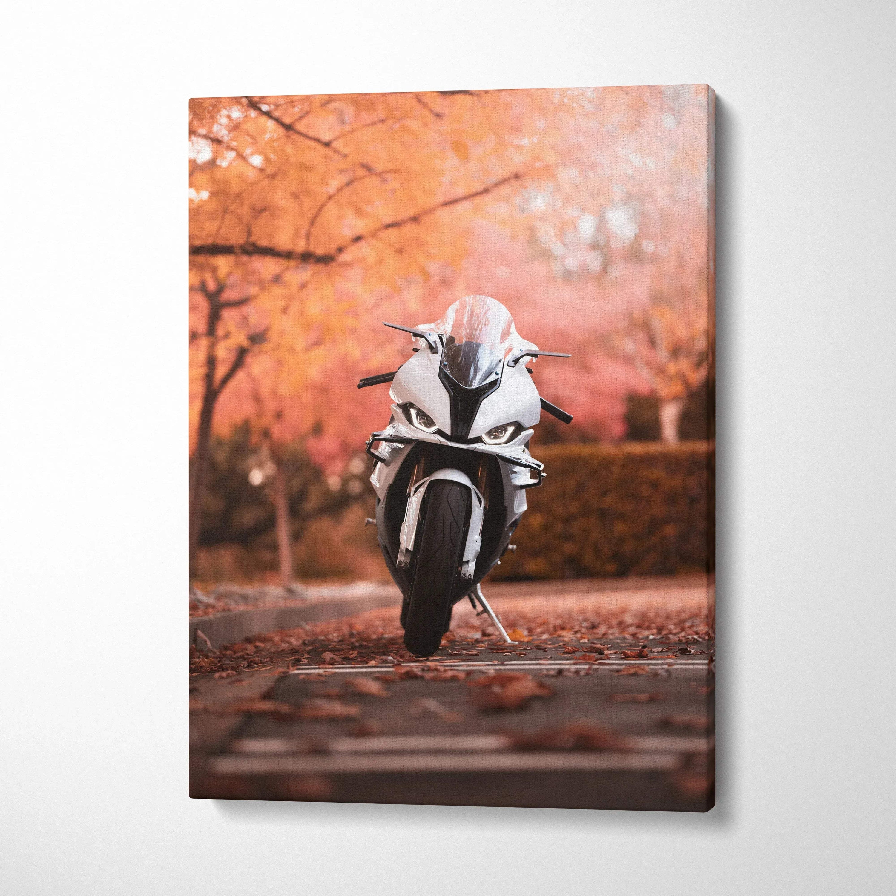BMW S1000RR motorcycle in autumn forest scene vertical canvas wall art with vibrant orange tones.