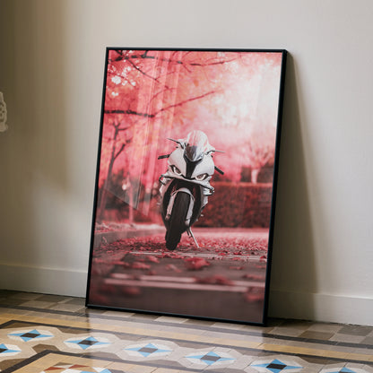 BMW S1000RR motorcycle poster with pink autumn leaves wall art in black frame.