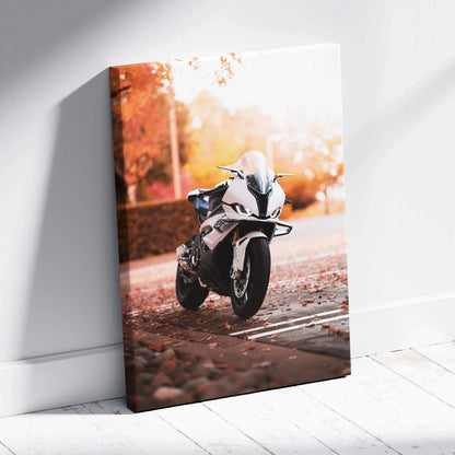 Vertical canvas wall art featuring a white BMW S1000RR motorcycle with autumn leaves background.