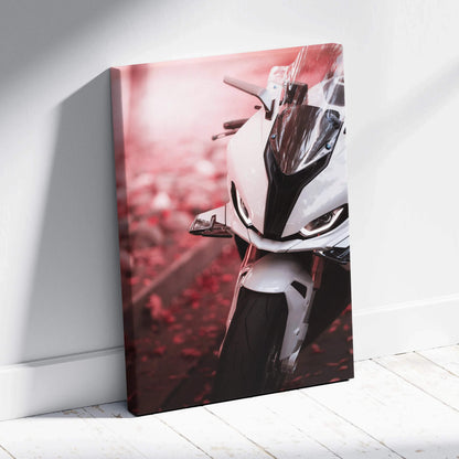 Vertical canvas wall art featuring a close-up of a white BMW S1000RR motorcycle with a blurred red background.
