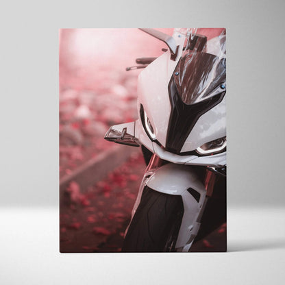 BMW S1000RR close-up on white vertical canvas wall art with sharp motorcycle details and blurred red background.
