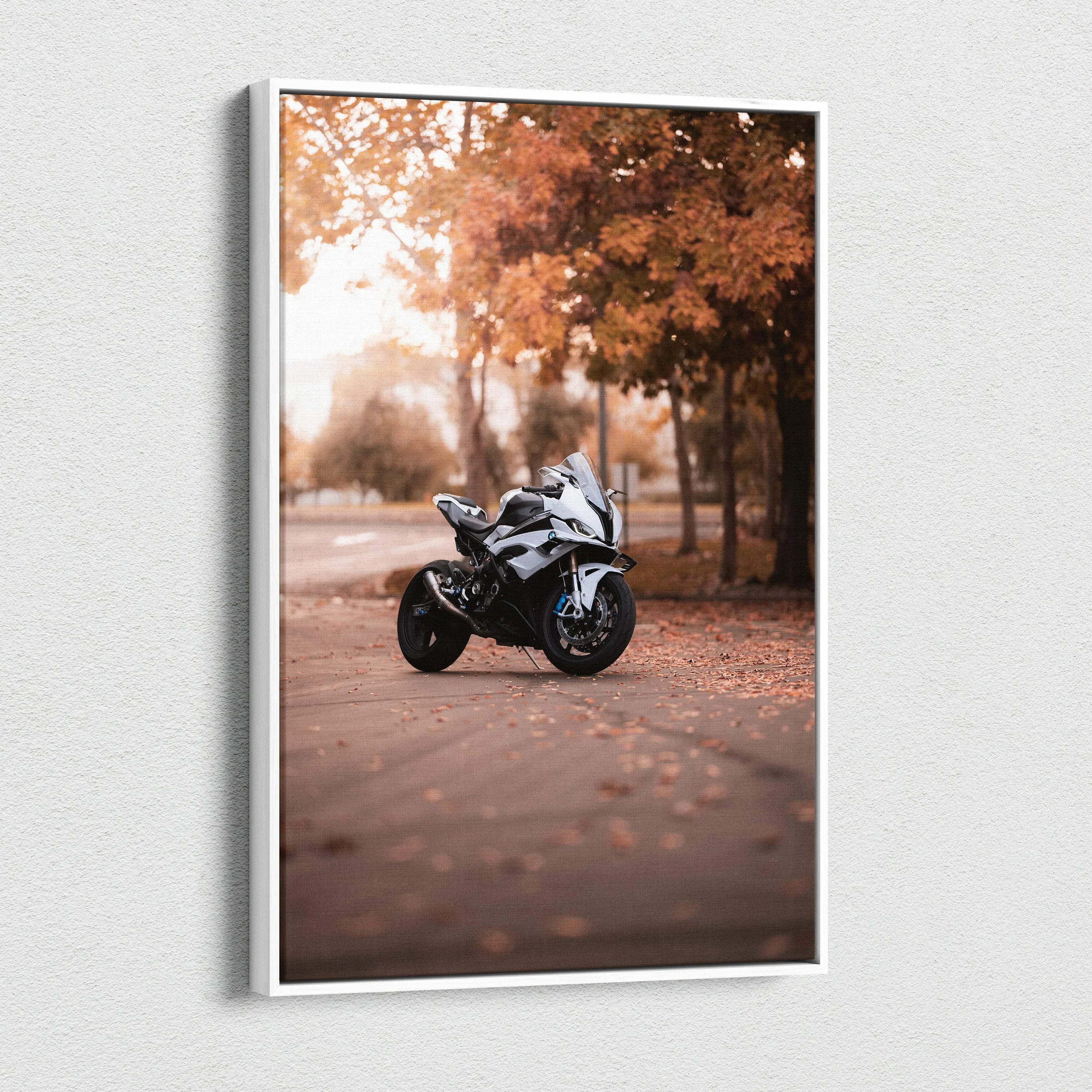 BMW S1000RR motorcycle in autumn setting on vertical canvas wall art with warm orange foliage.