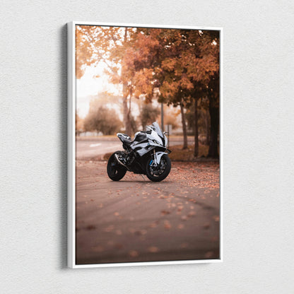 BMW S1000RR motorcycle in autumn setting on vertical canvas wall art with warm orange foliage.