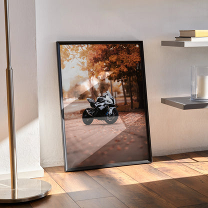 BMW S1000RR motorcycle poster with autumn forest background as stylish wall art in black frame.