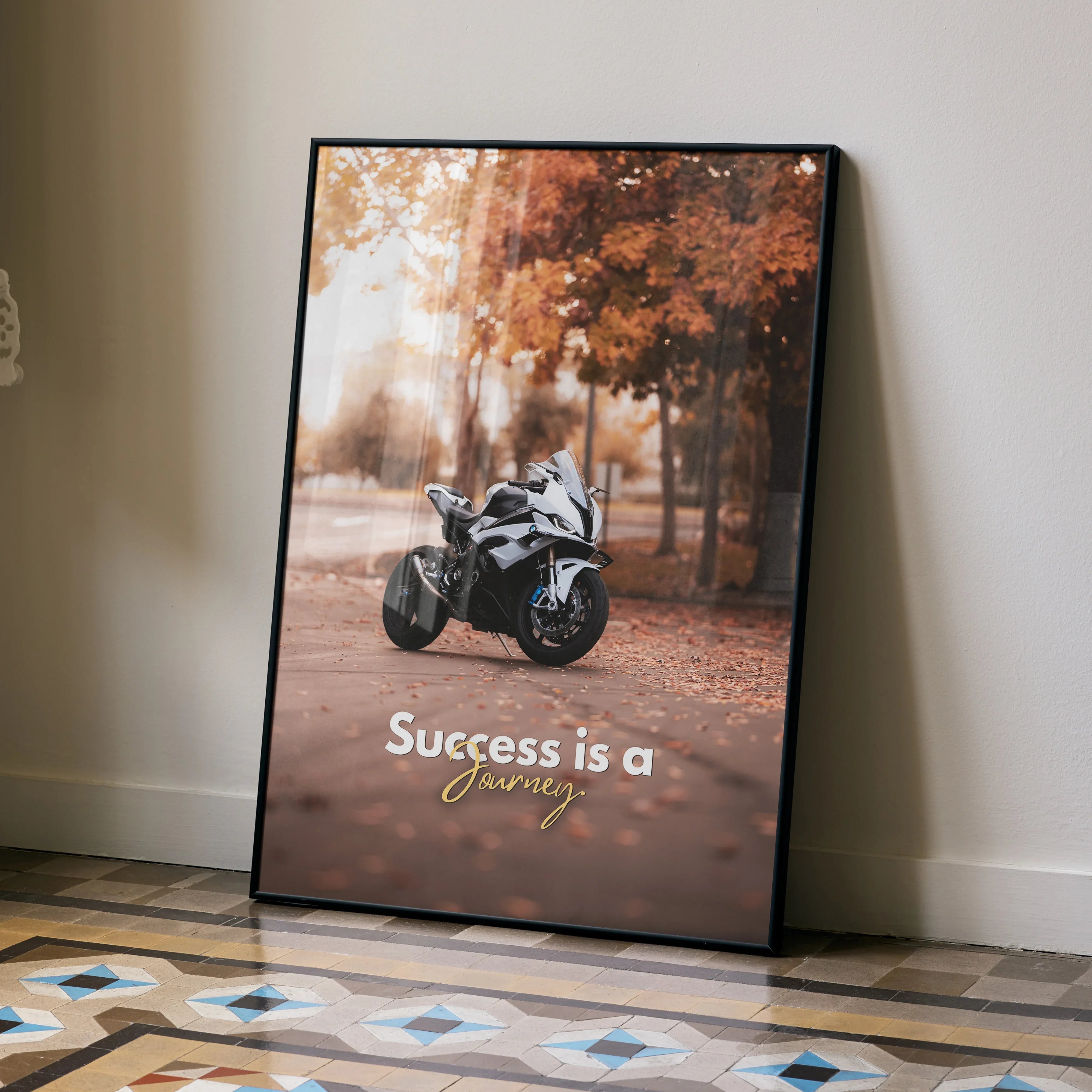 Motivational poster wall art featuring a BMW S1000RR motorcycle with autumn trees and inspiring text.