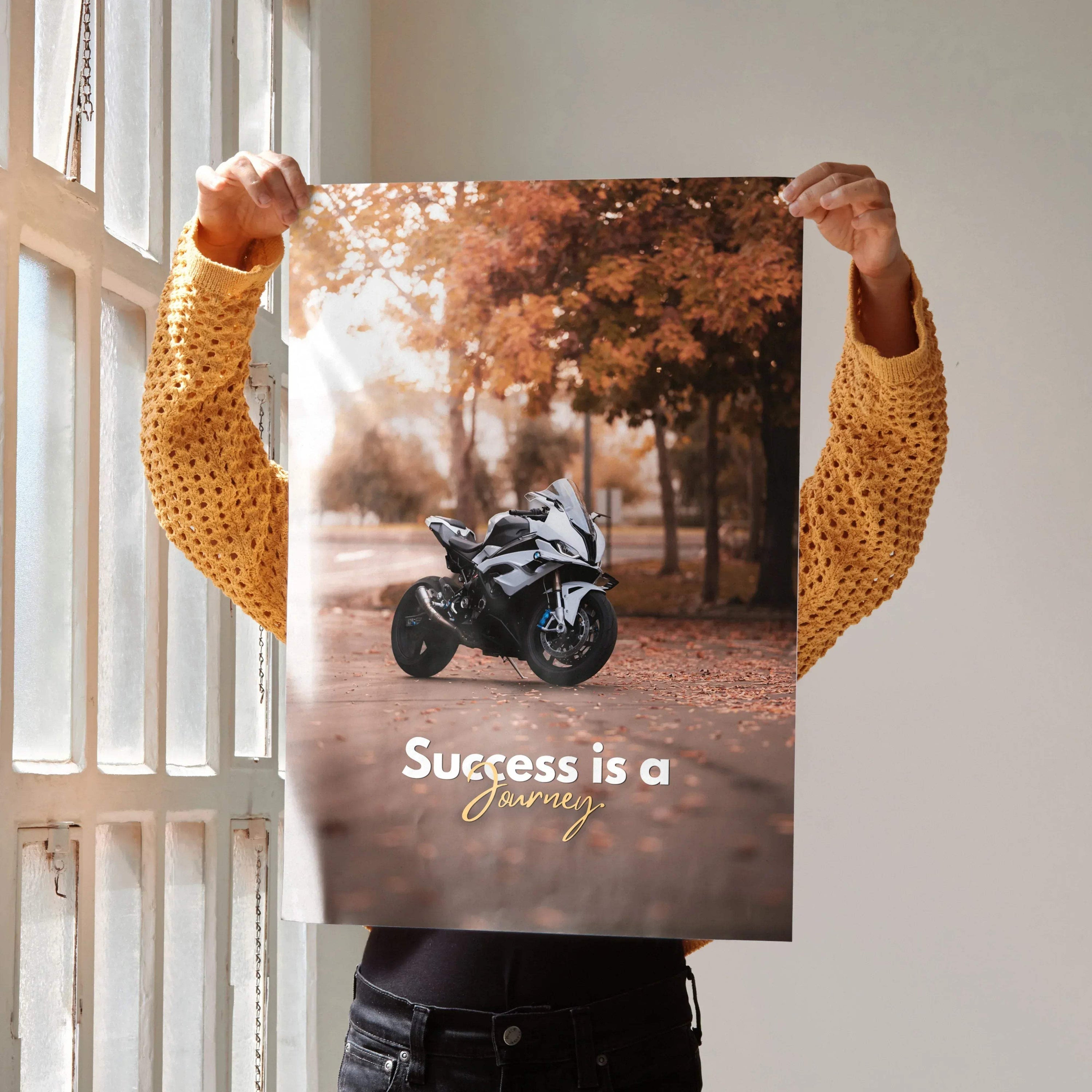 Motivational poster wall art featuring BMW S1000RR motorcycle with inspiring text on autumn road background.