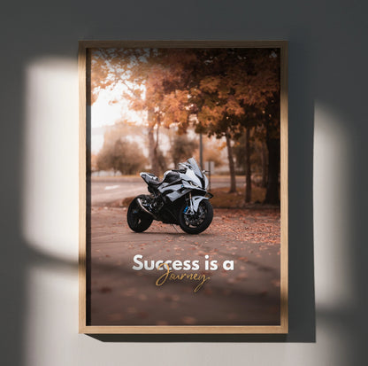 Motivational poster wall art featuring white BMW S1000RR motorcycle with inspiring text and autumn background.