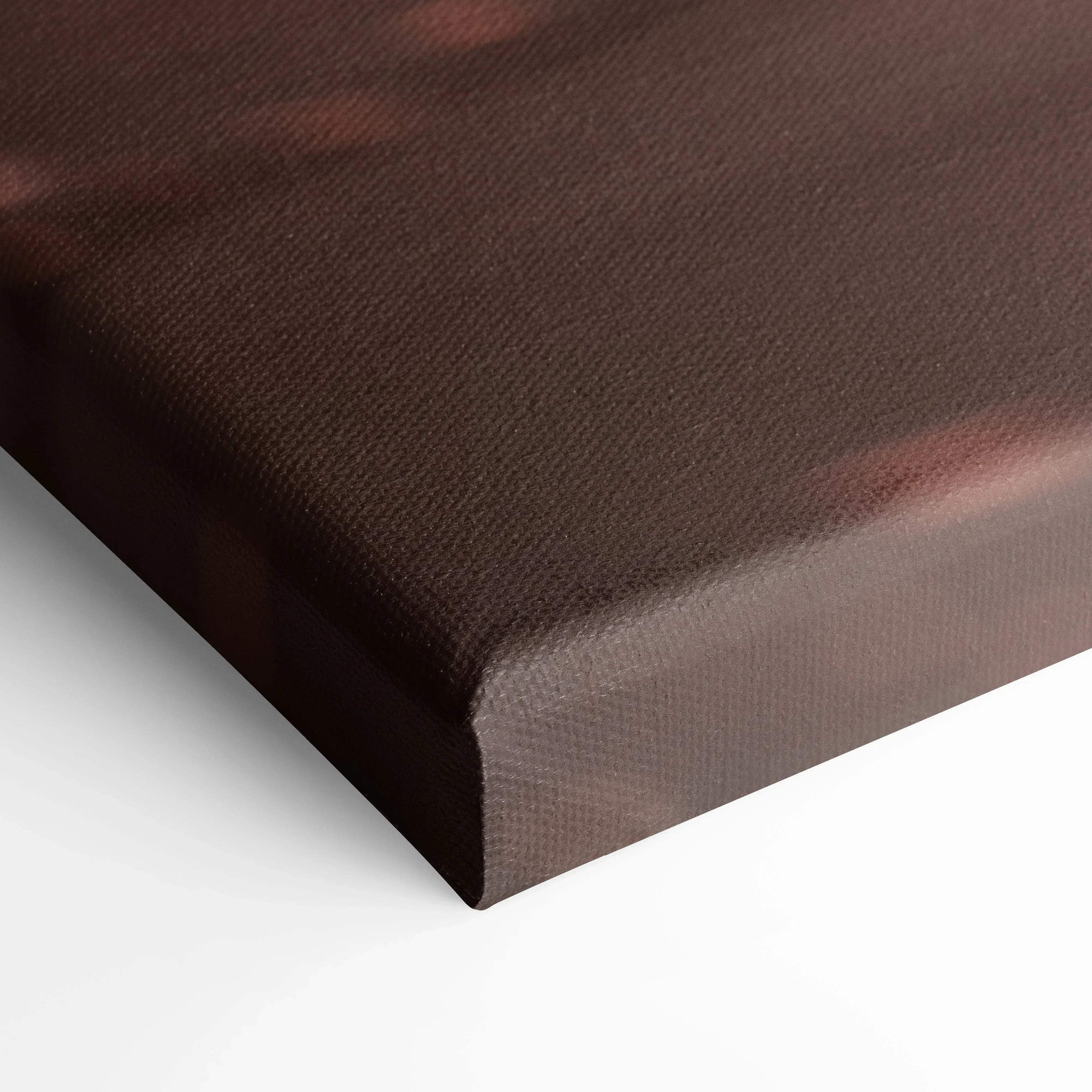 Close-up of textured brown canvas wall art corner with tight, museum-quality wrap.