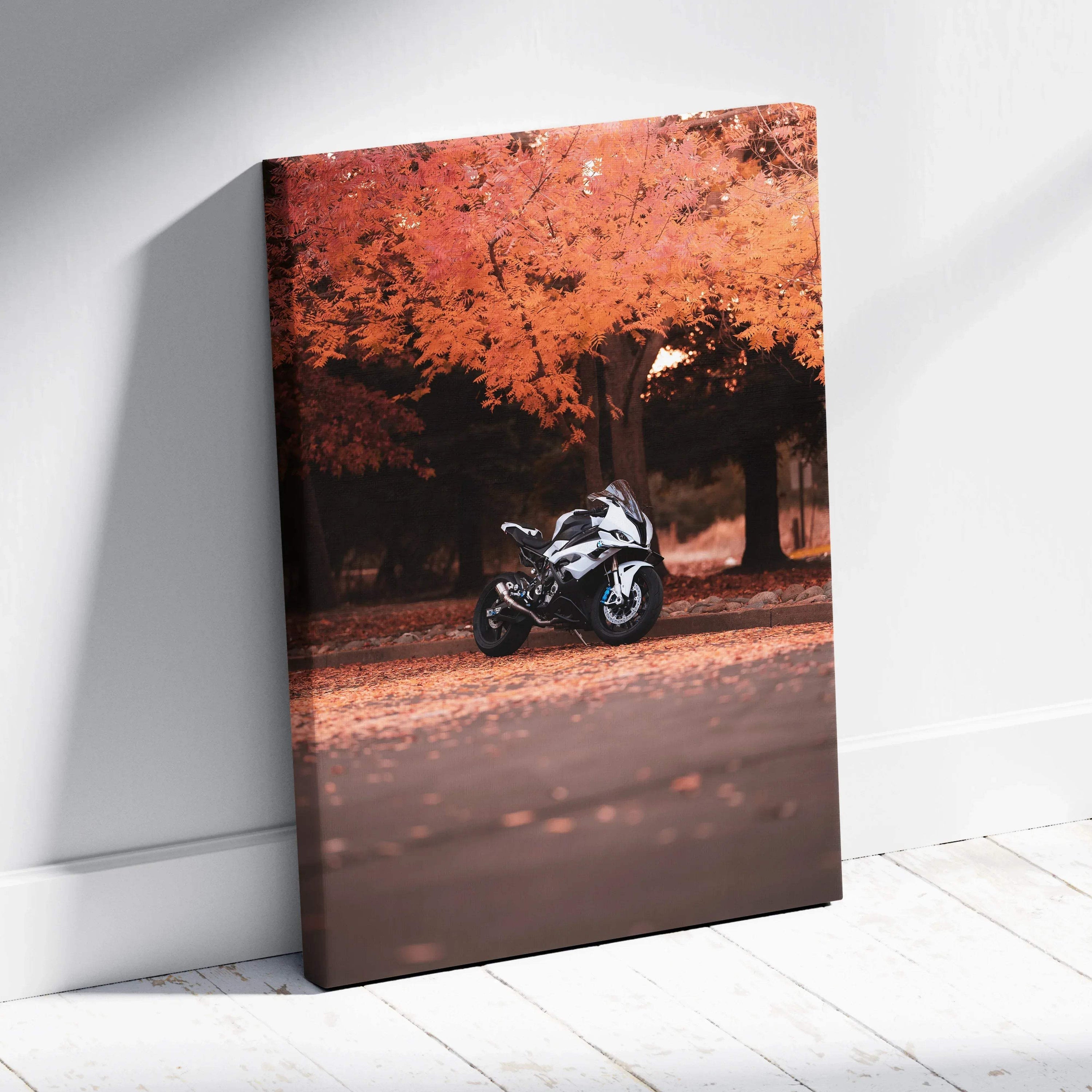 Vertical canvas art of a BMW S1000RR motorcycle under orange autumn trees, wall art with rich fall colors.