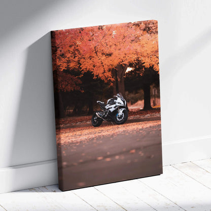 Vertical canvas art of a BMW S1000RR motorcycle under orange autumn trees, wall art with rich fall colors.