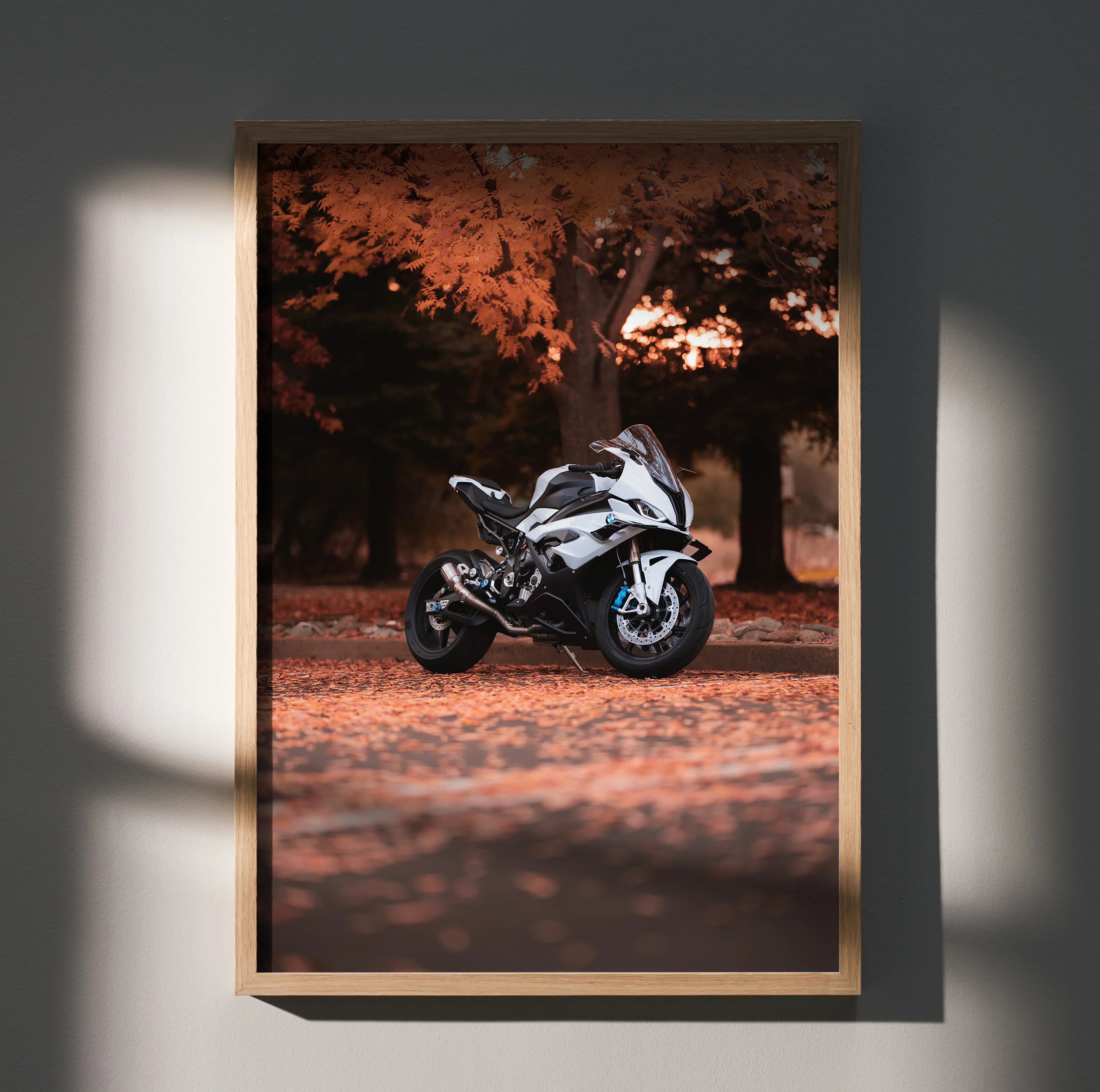 BMW S1000RR motorcycle poster with autumn forest background, modern wall art in warm tones.
