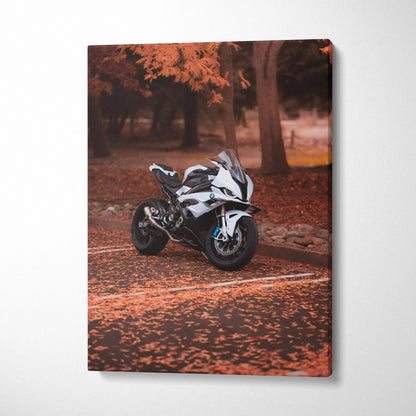 BMW S1000RR motorcycle on autumn forest road vertical canvas wall art with rich orange tones.