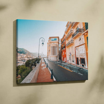 Modern architecture canvas wall art featuring urban buildings and street with clear blue sky.