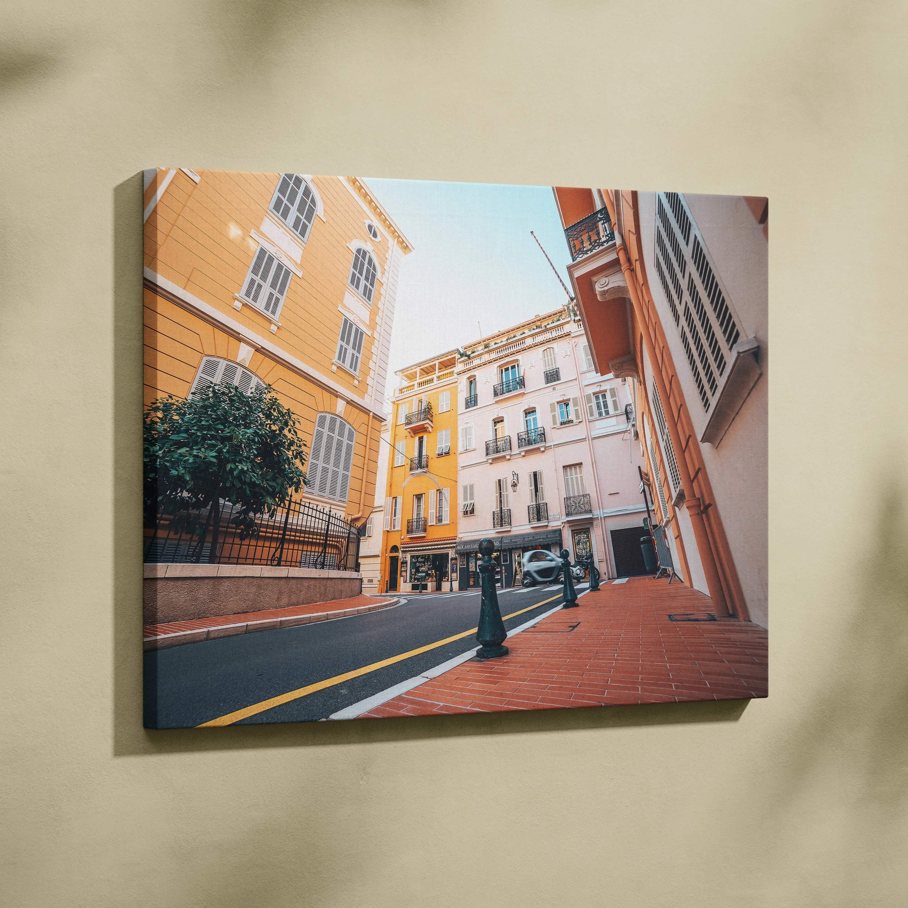 Canvas wall art featuring detailed digital architecture of colorful European buildings under a clear sky.