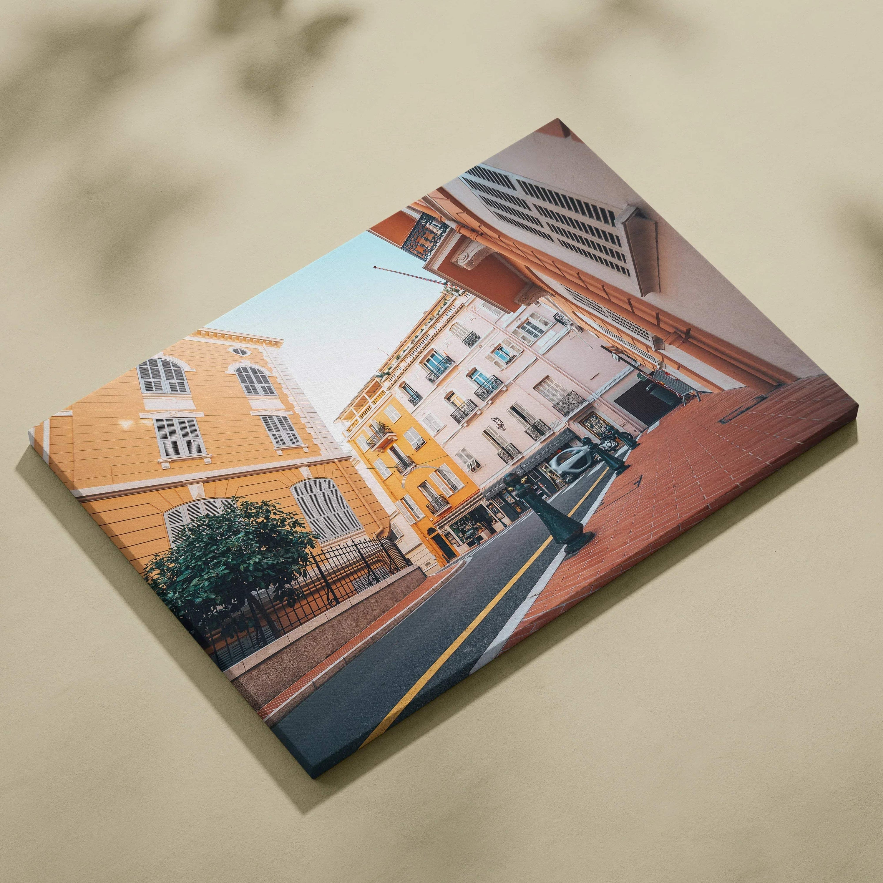 Canvas wall art featuring modern architectural buildings with warm tones and a clear sky background.