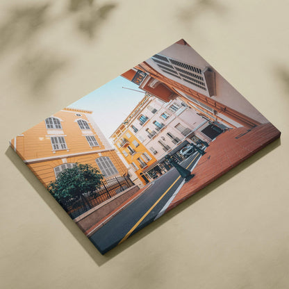 Canvas wall art featuring modern architectural buildings with warm tones and a clear sky background.